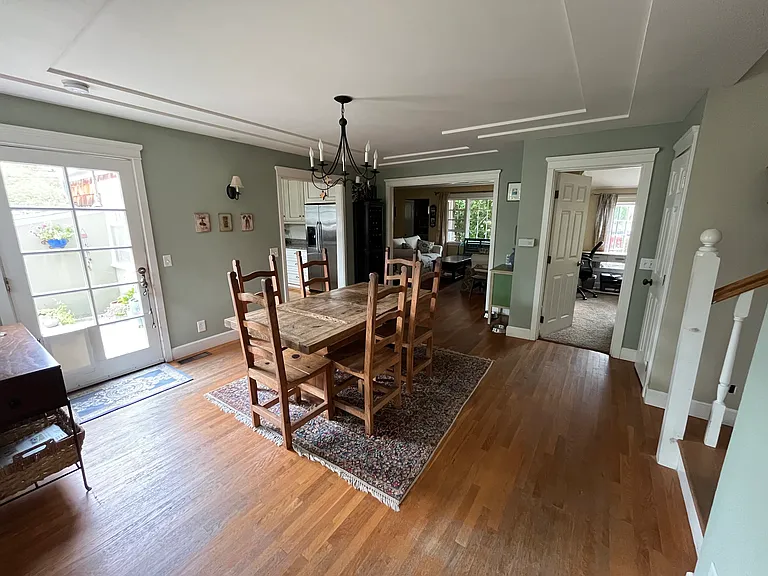 Dining room opens to living room and family room.
