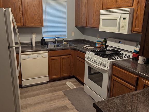 Kitchen/ dishwasher, gas stove, microwave, refrigerator