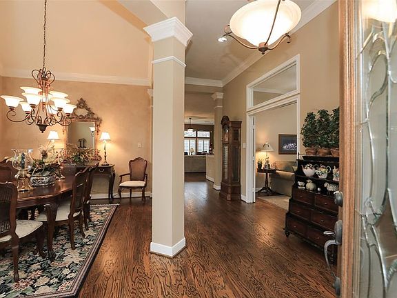 Enter this beauty and first thing you'll notice is the recently refinished wood floors that flow throughout the main living area, the finished product is luxurious and stunning!