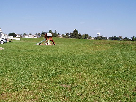 backing onto 125 acres of open space