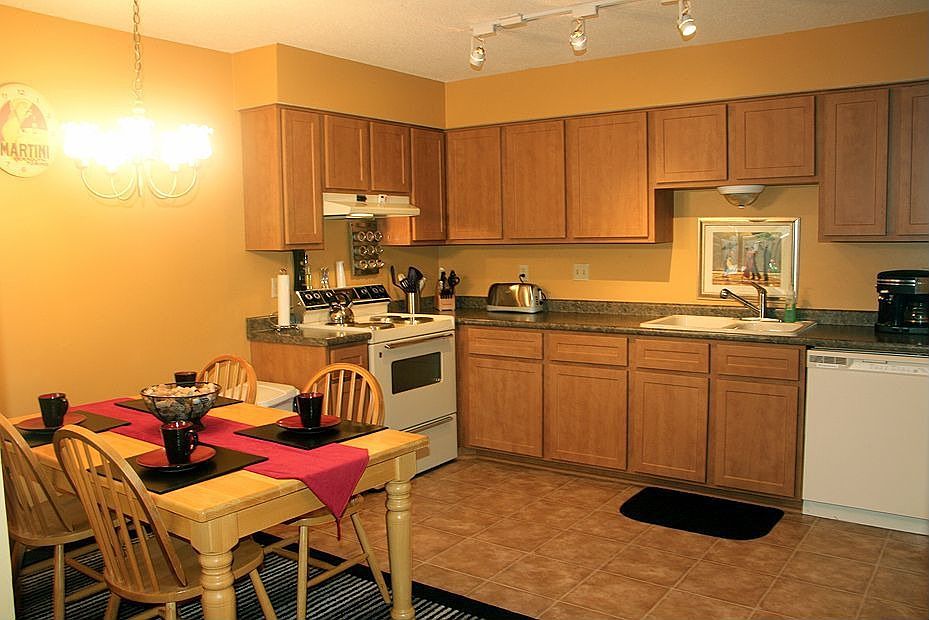 Bright Kitchen has new cupboards, flooring, and appliances!