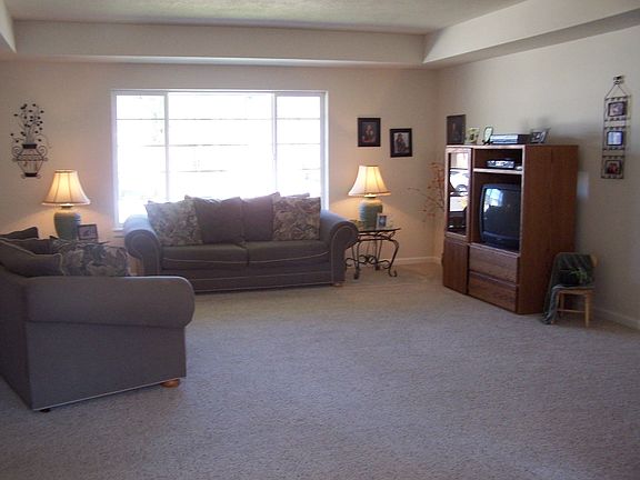 Inviting Living Room with Tray Ceiling