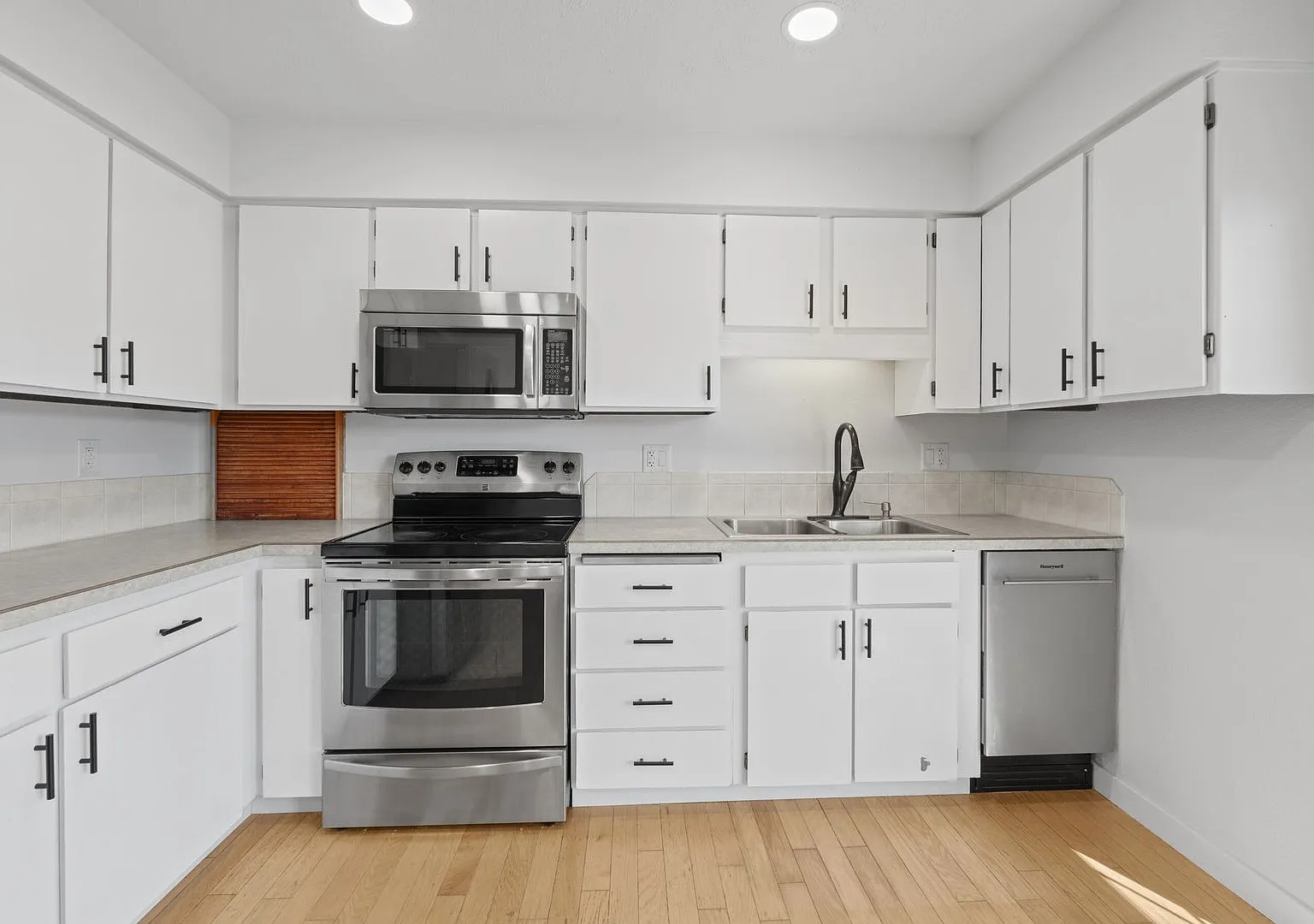 4 Bed 2 Bath Split Level home fully updated in Central Valley Greenacres neighborhood — Photo 4