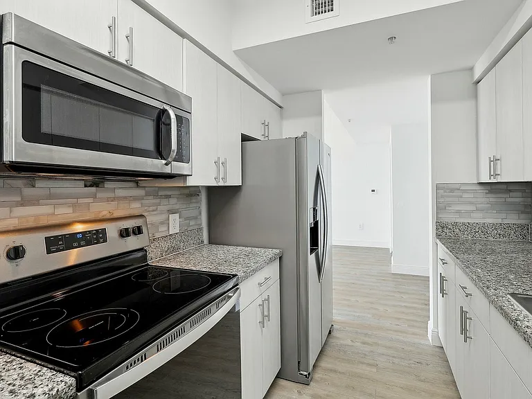 Modern kitchen with stainless steel appliances