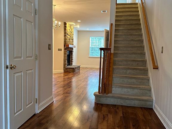 Foyer, Coat Closet and Stairs