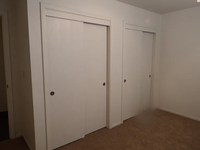 3rd bedroom with large 4 door wall to wall closet.