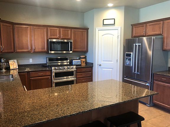 5th image of 13572 S Buckeye View Way
