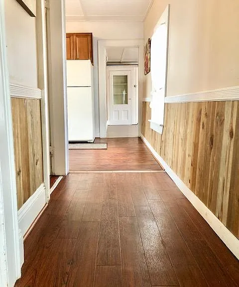Kitchen entry looking into living room