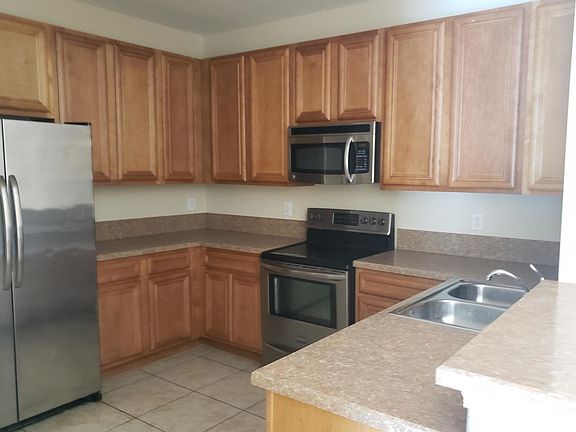 3rd image of 6935 Ortega Woods Dr Unit 1
