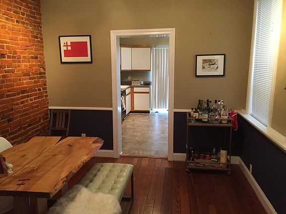 Dining Room with Exposed Brick