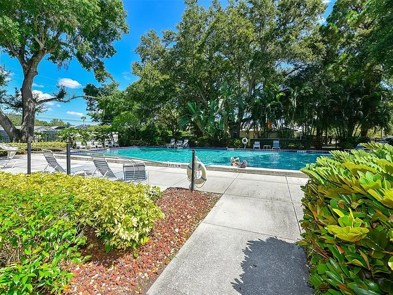 walkway from clubhouse to pool.