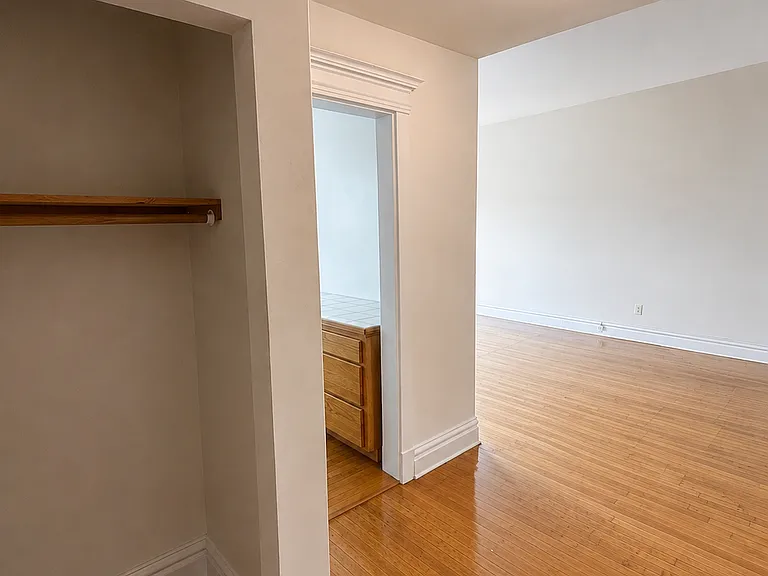 Entry coat closet to foyer