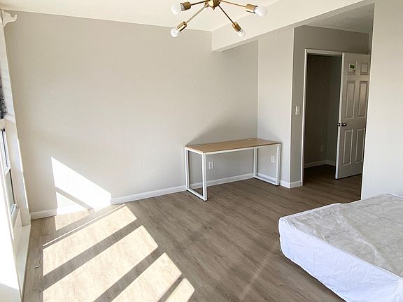 55" desk with lots of space for a TV/ seating area by the window