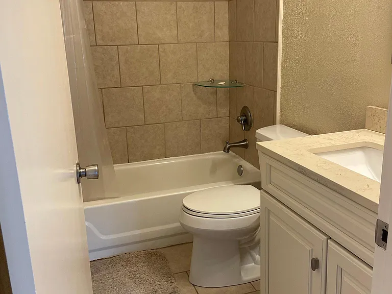 Full bath attached to bedroom