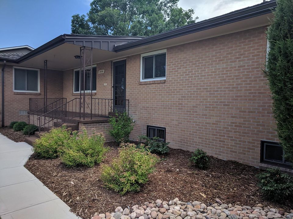 View of the front door and patio