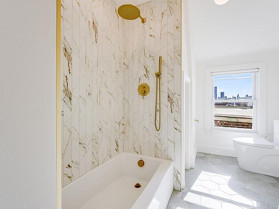 Bathroom with unobstructed Manhattan view