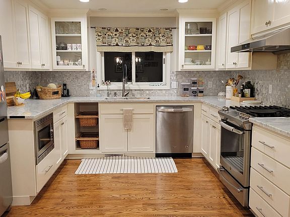 Kitchen with skylights and recessed lights