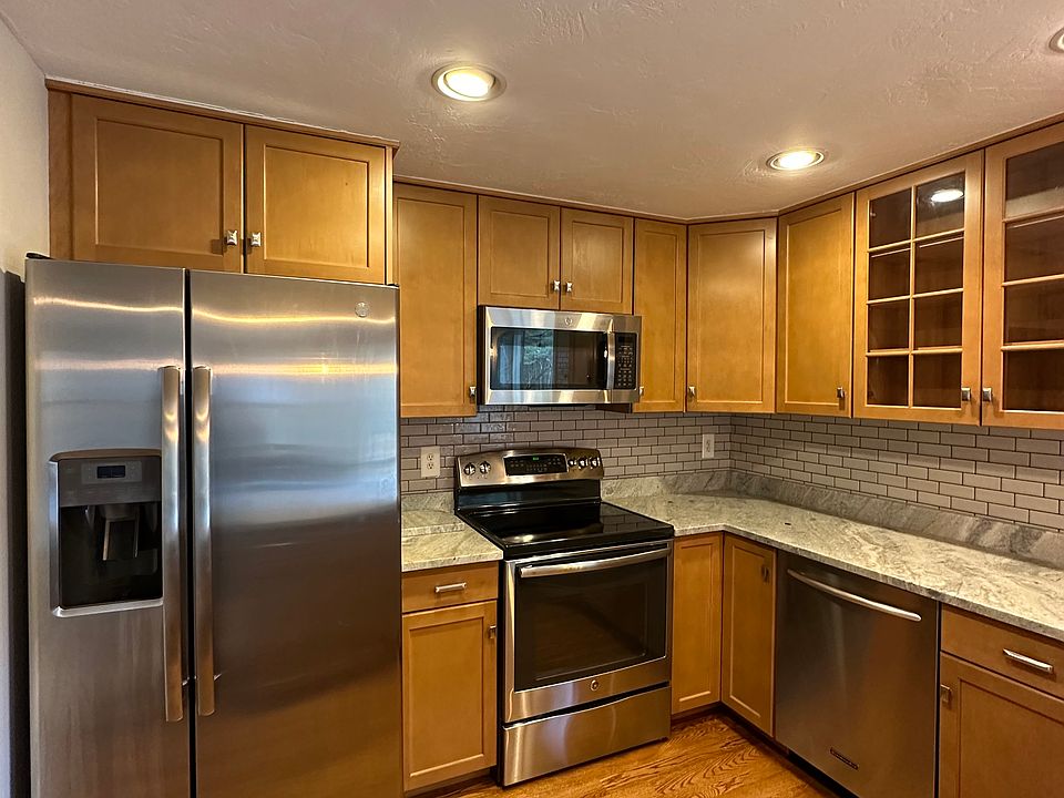 Kitchen with stainless steel appliances.