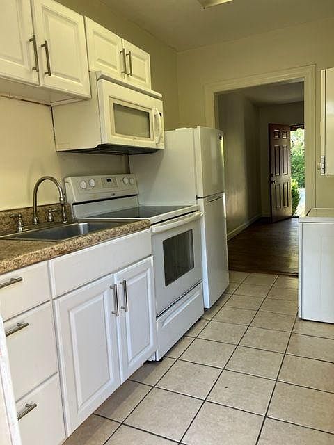 Galley kitchen; appliances provided