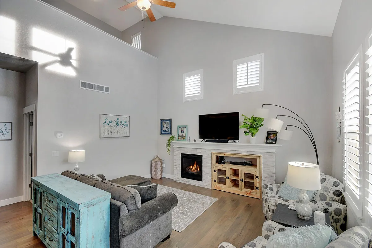 Vaulted Ceiling, Six Sunny Windows, Entertainment Center, Ceiling Fan, Gas Fireplace, Engineered Hardwood Floors - 6366 Pumpkin Ridge Dr #6