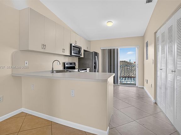 4th image of 6989 W 36th Ave Unit 202