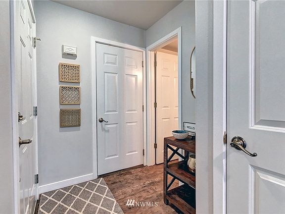 Enter through garage door straight ahead or front door to the left.