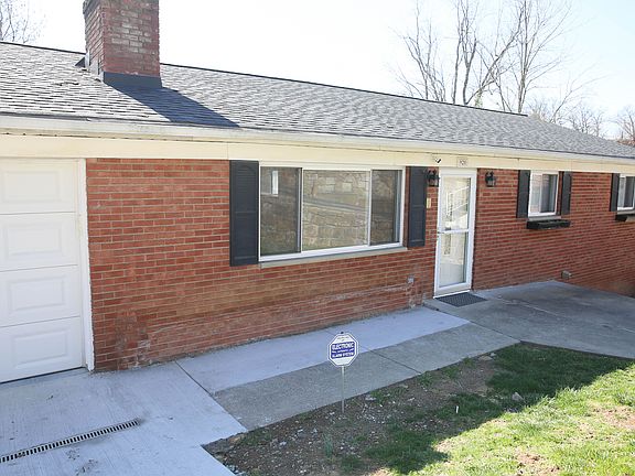 Upgraded patio area for additional seating - perfect for a porch swing other patio furniture
