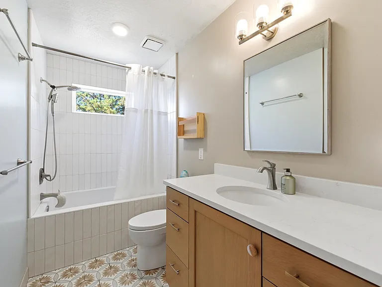 Well-appointed Jack-and-Jill bathroom providing easy access from adjacent bedrooms.