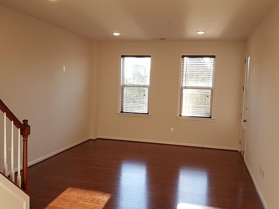 Living Room/ Rec Room/ 4th Bed Room at Main Level; Connected to Garage through Mud Room