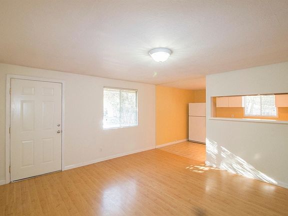 Living room with passthrough to kitchen
