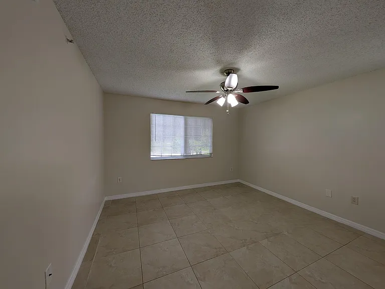 5011 Wiles Rd #208 — Photo 10