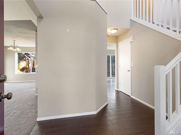 Updated tile plank floors as you walk-in.