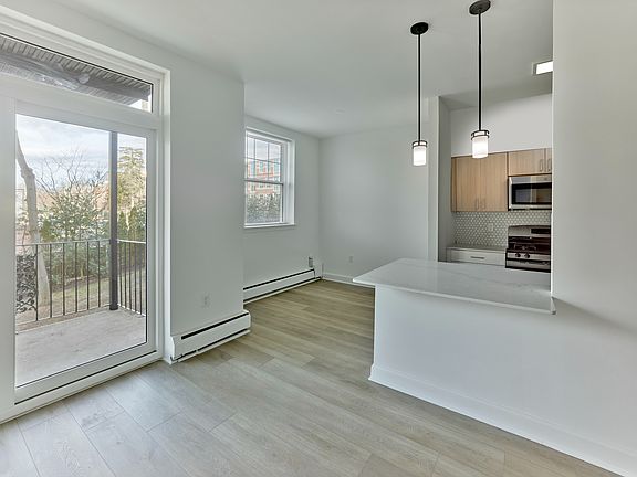 Enjoy natural light, modern finishes, and private balcony access at Crestwood Apartments in Wayne, PA