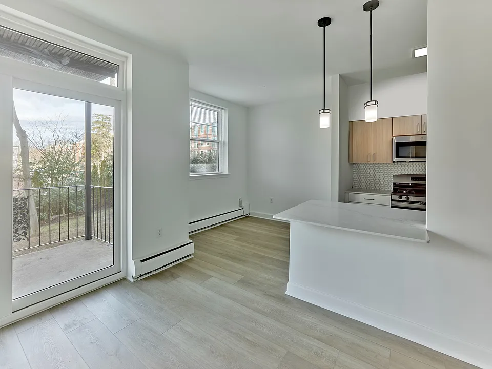 Enjoy natural light, modern finishes, and private balcony access at Crestwood Apartments in Wayne, PA