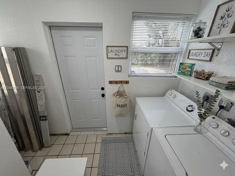 7720 Raleigh St — Photo 14