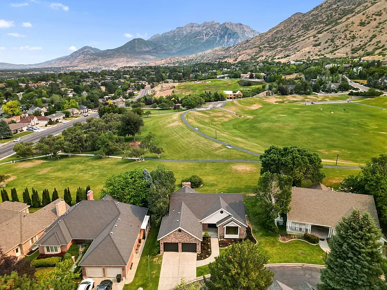 Mountain backdrop and backyard of Rock Canyon Park.