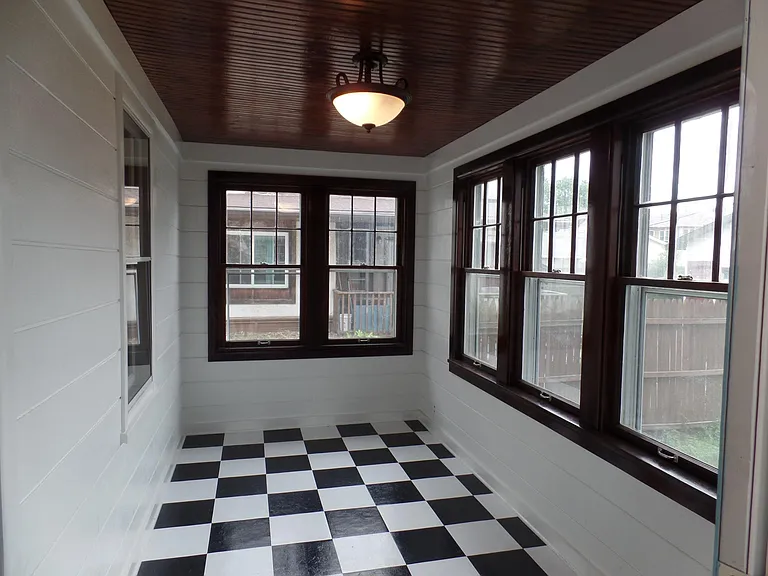 Three Season Porch off Kitchen.