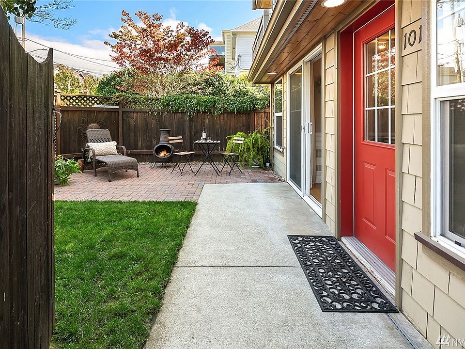 Stylish 768sf ground floor end unit offers added privacy and a walk score of 95--a walker's paradise! 