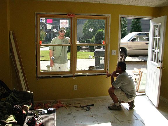 New windows and basement entrance door, tile, paint, etc.