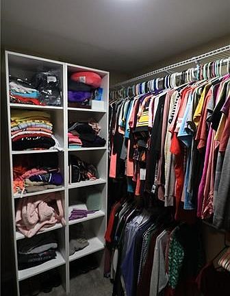 Recent remodel of the master bath allowed for a reconfiguration of the master closet to allow a walk-in.