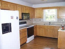 Spacious kitchen with beautiful cabinets