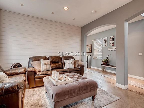 Front Living room to greet guests.  The focus wall has the "ship lap" for the HGTV touch.