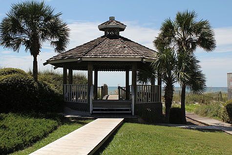 Beachfront gazebo behind 