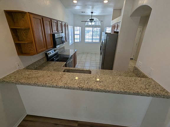 View into Kitchen and glass-walled dining area