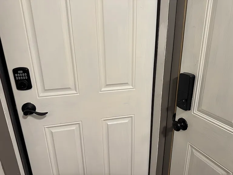 separately lockable doors from back entrance hall to garage and basement