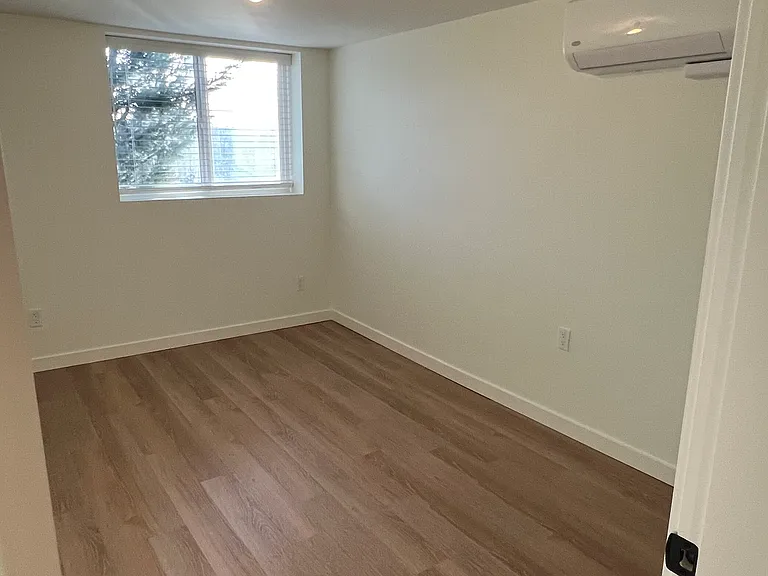 Bright bedroom with independent AC/Heating mini-split.