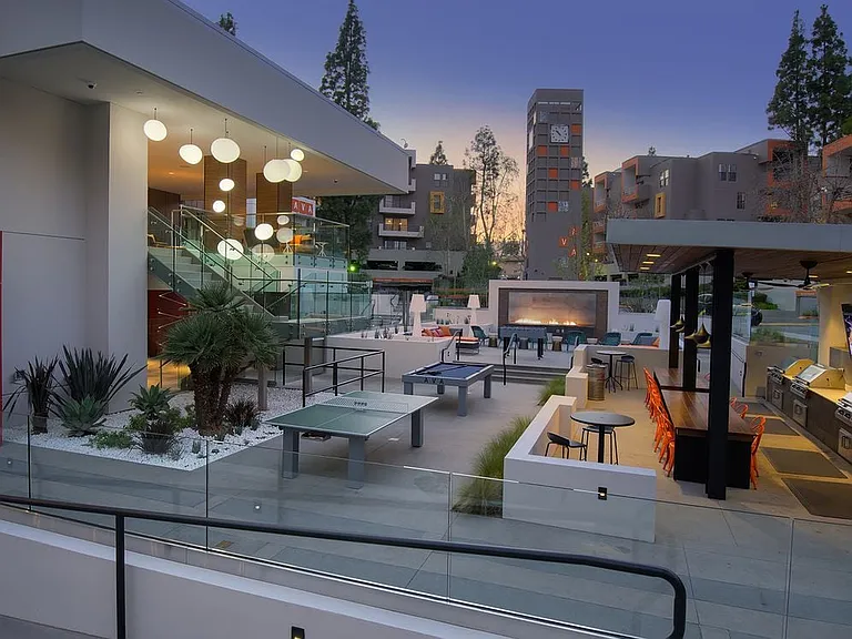 Outdoor Lounge with Seating Fire Pit and Game Tables