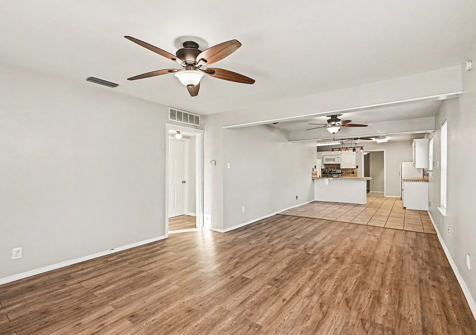 Functional Floorplan with Spacious Yard and Storage Shed — Photo 4