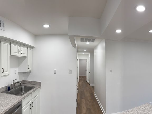 Recessed lights provide elegant and bright look.