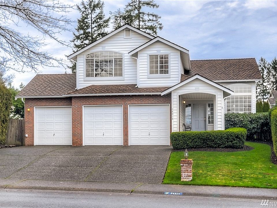 Welcome home! Located at the top of the hill in the Highlands at Lake Wilderness to enjoy both sunrise and sunsets Lots of garage space in this three car garage.